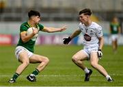 7 June 2025; Cillian Murphy of Meath in action against Niall McAndrew of Kildare during the Electric Ireland GAA Football All-Ireland Minor Paul McGirr Cup Final match between Kildare and Meath at Glenisk O'Connor Park, Tullamore, Offaly. Photo by Tom Beary/Sportsfile