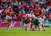 7 June 2025; Cian Lynch of Limerick in action against Cormac O'Brien of Cork during the Munster GAA Hurling Senior Championship final match between Limerick and Cork at TUS Gaelic Grounds in Limerick. Photo by Piaras Ó Mídheach/Sportsfile