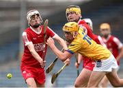 7 June 2025; Johnny Grace of Tipperary Gold in action against James Naughton of Cork White during the Electric Ireland Celtic Challenge Corn Michael Hogan final match between Tipperary Gold and Cork White at FBD Semple Stadium in Thurles, Tipperary. Photo by Michael P Ryan/Sportsfile