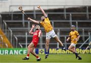 7 June 2025; Paul Calahan of Tipperary Gold claims possession ahead of Josh Brosnan of Cork White during the Electric Ireland Celtic Challenge Corn Michael Hogan final match between Tipperary Gold and Cork White at FBD Semple Stadium in Thurles, Tipperary. Photo by Michael P Ryan/Sportsfile