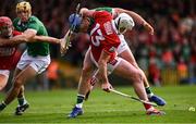 7 June 2025; Patrick Horgan of Cork is tackled by Mike Casey of Limerick during the Munster GAA Hurling Senior Championship final match between Limerick and Cork at TUS Gaelic Grounds in Limerick. Photo by Piaras Ó Mídheach/Sportsfile