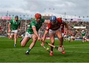 7 June 2025; Diarmuid Healy of Cork in action against Barry Nash of Limerick during the Munster GAA Hurling Senior Championship final match between Limerick and Cork at TUS Gaelic Grounds in Limerick. Photo by John Sheridan/Sportsfile