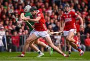 7 June 2025; Cian Lynch of Limerick is tackled by Robert Downey of Cork during the Munster GAA Hurling Senior Championship final match between Limerick and Cork at TUS Gaelic Grounds in Limerick. Photo by Piaras Ó Mídheach/Sportsfile