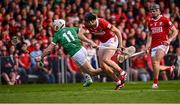 7 June 2025; Cian Lynch of Limerick is tackled by Robert Downey of Cork during the Munster GAA Hurling Senior Championship final match between Limerick and Cork at TUS Gaelic Grounds in Limerick. Photo by Piaras Ó Mídheach/Sportsfile