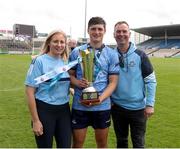 7 June 2025; Dublin captain Lucas Cass with his parents after the Electric Ireland Celtic Challenge Corn John Scott final match between Clare and Dublin at FBD Semple Stadium in Thurles, Tipperary. Photo by Michael P Ryan/Sportsfile