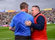 7 June 2025; Referee Thomas Walsh speaking with Cork manager Pat Ryan before the Munster GAA Hurling Senior Championship final match between Limerick and Cork at TUS Gaelic Grounds in Limerick. Photo by Piaras Ó Mídheach/Sportsfile