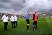 7 June 2025; Referee Thomas Walsh speaking with Cork manager Pat Ryan during the Munster GAA Hurling Senior Championship final match between Limerick and Cork at TUS Gaelic Grounds in Limerick. Photo by Piaras Ó Mídheach/Sportsfile