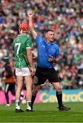 7 June 2025; Standby referee James Owens issues a yellow card to Barry Nash of Limerick during the Munster GAA Hurling Senior Championship final match between Limerick and Cork at TUS Gaelic Grounds in Limerick. Photo by Ray McManus/Sportsfile