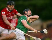 7 June 2025; Peter Casey of Limerick is tackled by Damien Cahalane of Cork during the Munster GAA Hurling Senior Championship final match between Limerick and Cork at TUS Gaelic Grounds in Limerick. Photo by Ray McManus/Sportsfile