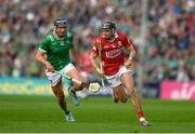 7 June 2025; Darragh Fitzgibbon of Cork in action against Gearoid Hegarty of Limerick during the Munster GAA Hurling Senior Championship final match between Limerick and Cork at TUS Gaelic Grounds in Limerick. Photo by John Sheridan/Sportsfile