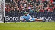 7 June 2025; Limerick goalkeeper Nickie Quaid is beaten for a goal by Shane Kingston of Cork in the penalty shoot-out of the Munster GAA Hurling Senior Championship final match between Limerick and Cork at TUS Gaelic Grounds in Limerick. Photo by Piaras Ó Mídheach/Sportsfile