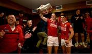 7 June 2025; Cork captain Robert Downey celebrates with the Mick Mackey Cup alongside team-mate Ciarán Joyce in the dressing room after his side's victory in the Munster GAA Hurling Senior Championship final match between Limerick and Cork at TUS Gaelic Grounds in Limerick. Photo by Piaras Ó Mídheach/Sportsfile