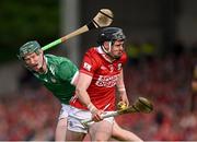 7 June 2025; Darragh Fitzgibbon of Cork is tackled by William O'Donoghue  of Limerick during the Munster GAA Hurling Senior Championship final match between Limerick and Cork at TUS Gaelic Grounds in Limerick. Photo by Ray McManus/Sportsfile