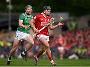 7 June 2025; Darragh Fitzgibbon of Cork is tackled by William O'Donoghue of Limerick during the Munster GAA Hurling Senior Championship final match between Limerick and Cork at TUS Gaelic Grounds in Limerick. Photo by Ray McManus/Sportsfile