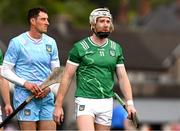 7 June 2025; Limerick captain Cian Lynch and Nickie Quaid   during the parade before the Munster GAA Hurling Senior Championship final match between Limerick and Cork at TUS Gaelic Grounds in Limerick. Photo by Ray McManus/Sportsfile