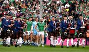 7 June 2025; Limerick captain Cian Lynch leads the players behind the St Patrick's Pipe Band, from Tulla, during the parade before the Munster GAA Hurling Senior Championship final match between Limerick and Cork at TUS Gaelic Grounds in Limerick. Photo by Ray McManus/Sportsfile