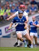 8 June 2025; Tomás Keyes of Laois is tackled by Cian Boran of Kildare during the Joe McDonagh Cup final match between Kildare and Laois at Croke Park in Dublin. Photo by Ray McManus/Sportsfile