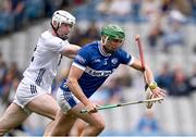 8 June 2025; Mark Dowling of Laois is tackled by Richy Hogan of Kildare during the Joe McDonagh Cup final match between Kildare and Laois at Croke Park in Dublin. Photo by Ray McManus/Sportsfile