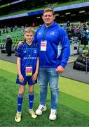 7 June 2025; Mascot Will Homan wth Leinster player Tadhg Furlong before the United Rugby Championship semi-final match between Leinster and Glasgow Warriors at the Aviva Stadium in Dublin. Photo by Brendan Moran/Sportsfile
