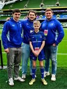 7 June 2025; Mascot Will Homan wth Leinster players Cormac Foley, John McKee and Tadhg Furlong before the United Rugby Championship semi-final match between Leinster and Glasgow Warriors at the Aviva Stadium in Dublin. Photo by Brendan Moran/Sportsfile