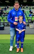7 June 2025; Mascot Ciarán Golden wth Leinster player Tadhg Furlong before the United Rugby Championship semi-final match between Leinster and Glasgow Warriors at the Aviva Stadium in Dublin. Photo by Brendan Moran/Sportsfile