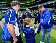7 June 2025; Mascot Ciarán Golden wth Leinster player Tadhg Furlong before the United Rugby Championship semi-final match between Leinster and Glasgow Warriors at the Aviva Stadium in Dublin. Photo by Brendan Moran/Sportsfile