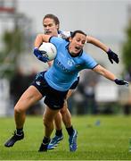 8 June 2025; Hannah Tyrrell of Dublin is tackled by Emma Murray of Waterford during the TG4 All-Ireland Senior Championship match between Waterford and Dublin at Dungarvan GAA Club in Dungarvan, Waterford. Photo by Seb Daly/Sportsfile
