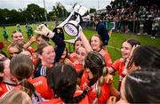 8 June 2025; Armagh players celebrate with the cup after their side's victory in the LGFA All-Ireland U14 Bronze Final match between Limerick and Armagh at Coralstown/Kinnegad GAA in Westmeath. Photo by Ben McShane/Sportsfile