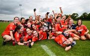 8 June 2025; Armagh players celebrate with the cup after their side's victory in the LGFA All-Ireland U14 Bronze Final match between Limerick and Armagh at Coralstown/Kinnegad GAA in Westmeath. Photo by Ben McShane/Sportsfile