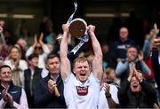 8 June 2025; Kildare captain Rian Boran lifts the Joe McDonagh Cup after the Joe McDonagh Cup final match between Kildare and Laois at Croke Park in Dublin. Photo by Ramsey Cardy/Sportsfile