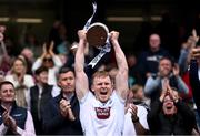8 June 2025; Kildare captain Rian Boran lifts the Joe McDonagh Cup after the Joe McDonagh Cup final match between Kildare and Laois at Croke Park in Dublin. Photo by Ramsey Cardy/Sportsfile