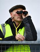 8 June 2025; A steward watches on with a pair of binoculars during the LGFA All-Ireland U14 Platinum Final match between Cork and Galway at Nenagh Éire Óg GAA Club in Nenagh, Tipperary. Photo by Tyler Miller/Sportsfile