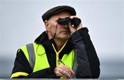 8 June 2025; A steward watches on with a pair of binoculars during the LGFA All-Ireland U14 Platinum Final match between Cork and Galway at Nenagh Éire Óg GAA Club in Nenagh, Tipperary. Photo by Tyler Miller/Sportsfile