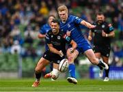 7 June 2025; Adam Hastings of Glasgow Warriors and Tommy O'Brien of Leinster contest possession during the United Rugby Championship semi-final match between Leinster and Glasgow Warriors at the Aviva Stadium in Dublin. Photo by Brendan Moran/Sportsfile