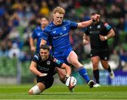 7 June 2025; Adam Hastings of Glasgow Warriors and Tommy O'Brien of Leinster contest possession during the United Rugby Championship semi-final match between Leinster and Glasgow Warriors at the Aviva Stadium in Dublin. Photo by Brendan Moran/Sportsfile