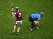 8 June 2025; David Burke of Galway makes a pass as referee Johnny Murphy ducks out of the way during the Leinster GAA Senior Hurling Championship final match between Kilkenny and Galway at Croke Park in Dublin. Photo by Piaras Ó Mídheach/Sportsfile