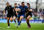 7 June 2025; Rónan Kelleher of Leinster is tackled by Kyle Rowe of Glasgow Warriors during the United Rugby Championship semi-final match between Leinster and Glasgow Warriors at the Aviva Stadium in Dublin. Photo by Brendan Moran/Sportsfile