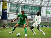 6 June 2025; Kasey McAteer of Republic of Ireland in action against Krépin Diatta of Senegal during the international friendly match between Republic of Ireland and Senegal at the Aviva Stadium in Dublin. Photo by Michael P Ryan/Sportsfile