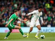 6 June 2025; Abdou Diallo of Senegal in action against Jack Taylor of Republic of Ireland  during the international friendly match between Republic of Ireland and Senegal at the Aviva Stadium in Dublin. Photo by Michael P Ryan/Sportsfile