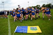 8 June 2025; Tipperary players celebrate with the cup after the LGFA All-Ireland U14 Silver Final match between Tipperary and Cavan at Coralstown/Kinnegad GAA in Westmeath. Photo by Ben McShane/Sportsfile