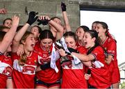 8 June 2025; Cork captain Aoife Harte lifts the cup after the LGFA All-Ireland U14 Platinum Final match between Cork and Galway at Nenagh Éire Óg GAA Club in Nenagh, Tipperary. Photo by Tyler Miller/Sportsfile