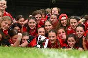 8 June 2025; Cork player celebrate with the cup after the LGFA All-Ireland U14 Platinum Final match between Cork and Galway at Nenagh Éire Óg GAA Club in Nenagh, Tipperary. Photo by Tyler Miller/Sportsfile