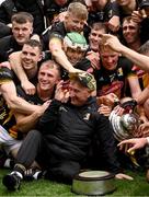 8 June 2025; The Kilkenny team celebrate with kitman Dennis 'Rackard' Coady and the Bob O'Keeffe Cup after the Leinster GAA Senior Hurling Championship final match between Kilkenny and Galway at Croke Park in Dublin. Photo by Ramsey Cardy/Sportsfile