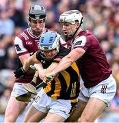8 June 2025; TJ Reid of Kilkenny is tackled by Padraic Mannion of Galway and Daithí Burke of Galway during the Leinster GAA Senior Hurling Championship final match between Kilkenny and Galway at Croke Park in Dublin. Photo by Ray McManus/Sportsfile