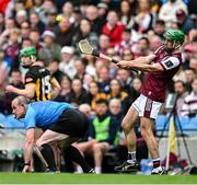 8 June 2025; David Burke of Galway makes a pass as referee Johnny Murphy ducks out of the way during the Leinster GAA Senior Hurling Championship final match between Kilkenny and Galway at Croke Park in Dublin. Photo by Ray McManus/Sportsfile