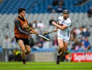 8 June 2025; Cathal McCabe of Kildare runs to his place after selecting a replacement hurley from XXX during the Joe McDonagh Cup final match between Kildare and Laois at Croke Park in Dublin. Photo by Ray McManus/Sportsfile