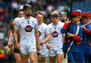 8 June 2025; Kildare captain Rian Boran leads his team behind The Artane Band before the Joe McDonagh Cup final match between Kildare and Laois at Croke Park in Dublin. Photo by Ray McManus/Sportsfile