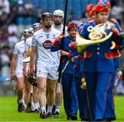 8 June 2025; Kildare captain Rian Boran leads his team behind The Artane Band before the Joe McDonagh Cup final match between Kildare and Laois at Croke Park in Dublin. Photo by Ray McManus/Sportsfile