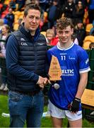 7 June 2025; Bobby O'Connor of Laois is presented with the best and fairest award by Ciaran Kearney of the GAA after the Electric Ireland Celtic Challenge Corn William Robinson final match between Meath and Laois at the GAA National Games Development Centre in Abbotstown, Dublin. Photo by Stephen Marken/Sportsfile