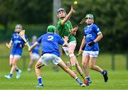7 June 2025; Cathal Flynn of Meath in action against Conor Hickey of Laois during the Electric Ireland Celtic Challenge Corn William Robinson final match between Meath and Laois at the GAA National Games Development Centre in Abbotstown, Dublin. Photo by Stephen Marken/Sportsfile
